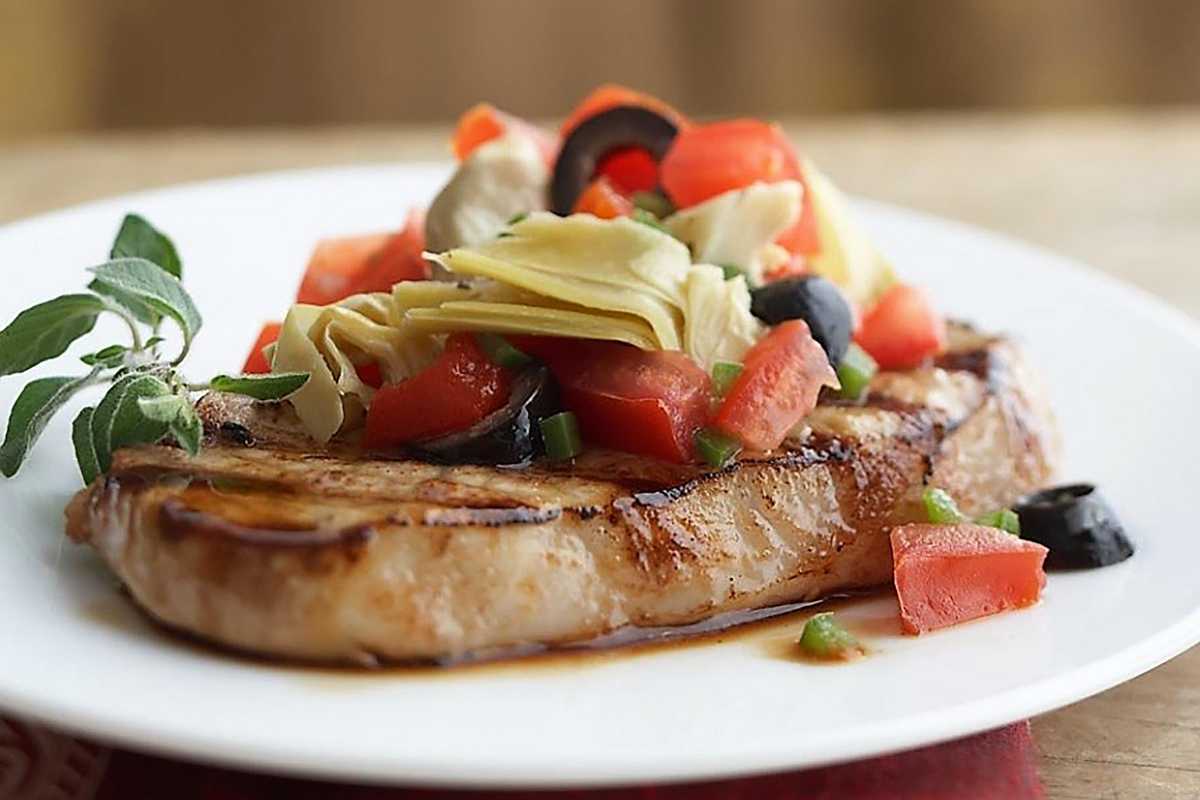 Grilled Pork Chops with Mediterranean Style Toppings